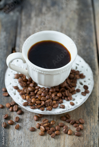 cup of coffee on wooden surface