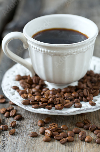 cup of coffee on wooden surface