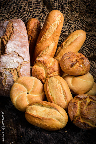 Different types of bread and rolls photo