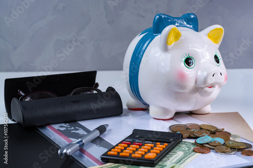 Piggy bank and business  assesories photo