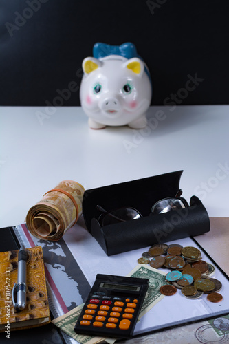 Piggy bank and business  assesories photo