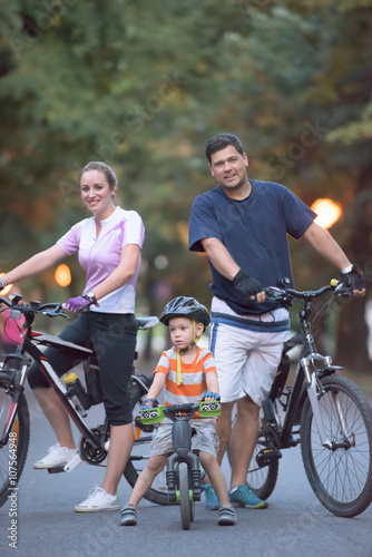 young family with bicycles