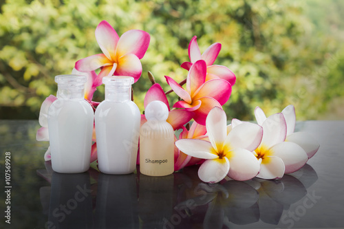 Mini set of bubble bath and shower gel liquid with pink flower