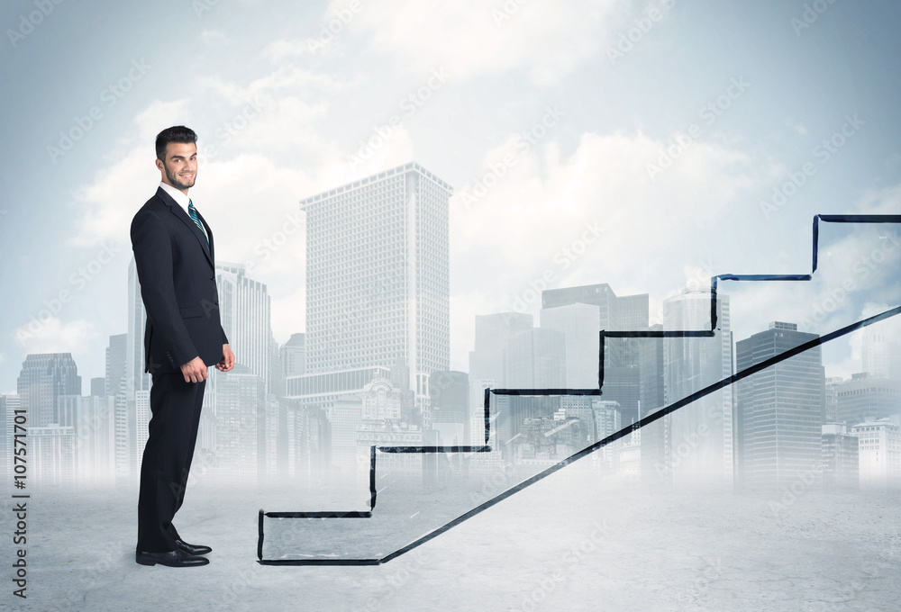 Business person in front of a staircase Business person in front of a staircase