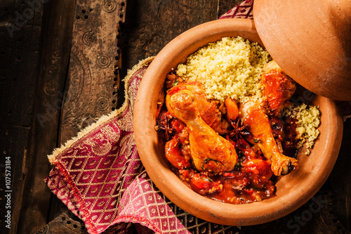 Traditional Tajine Dish with Chicken and Couscous photo