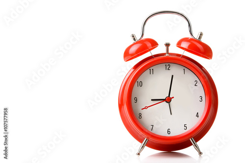 old windup loud alarm clock isolated on white background