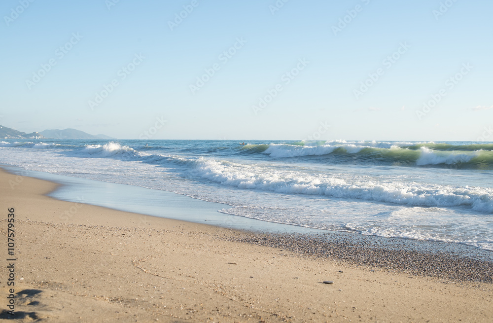 Big waves in the Mediterranean sea on a clear sunny day.