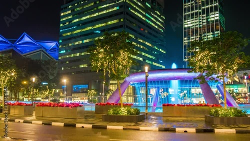 real night light traffic circle suntec city mall panorama 4k time lapse singapore
 photo