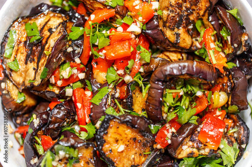 grilled eggplant and paprika with herbs  garlic and olive oil