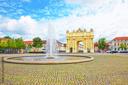 Street view on Brandenburg Gate and fountain in Potsdam