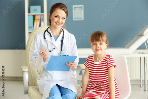 Doctor and little girl in t...