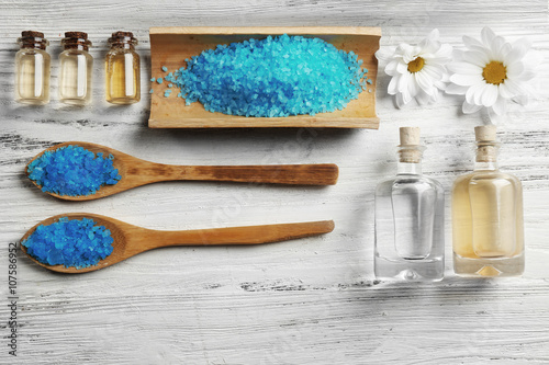 Spa ingredients on a white table, top view