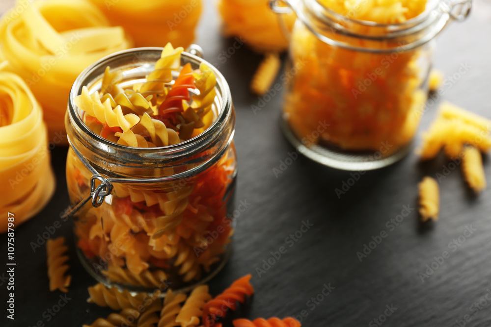 Uncooked pasta in jar, closeup Uncooked pasta in jar, closeup