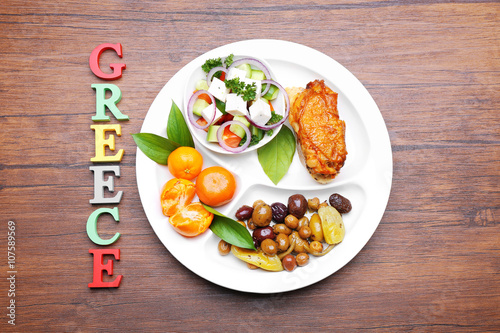 Traditional Greek lunch on wooden background