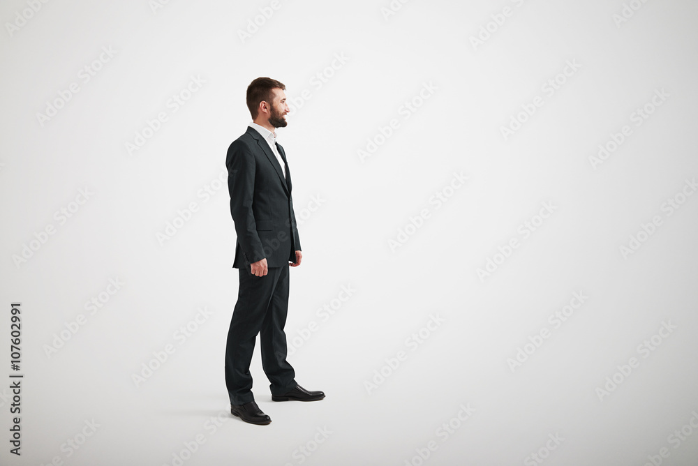 Caucasian man with beard looking to the side Caucasian man with beard looking to the side