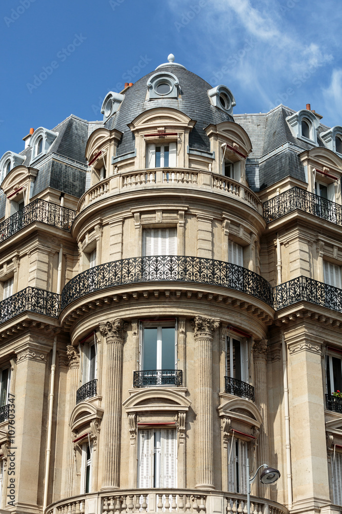 Facade of typical house with balcony in 16th arrondisement of Paris.  France