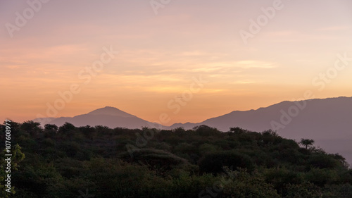 Morning glow against mountains background. Manyara Lake National Park  Tanzania.  