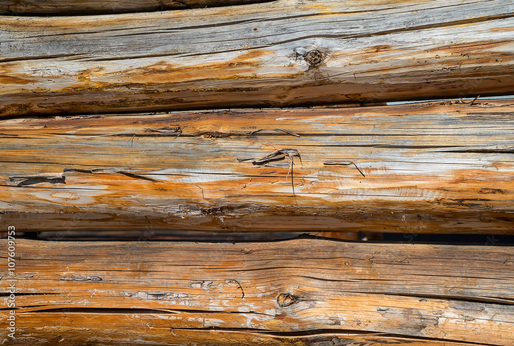a wall made of old logs orange a wall made of old logs orange
