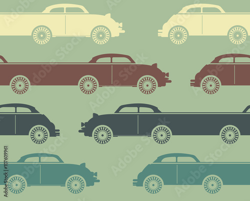 Decorative pattern with colorful retro cars on light green backg
