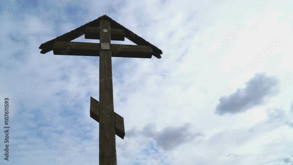 Orthodox cross on a background of floating clouds Orthodox cross on a background of floating clouds