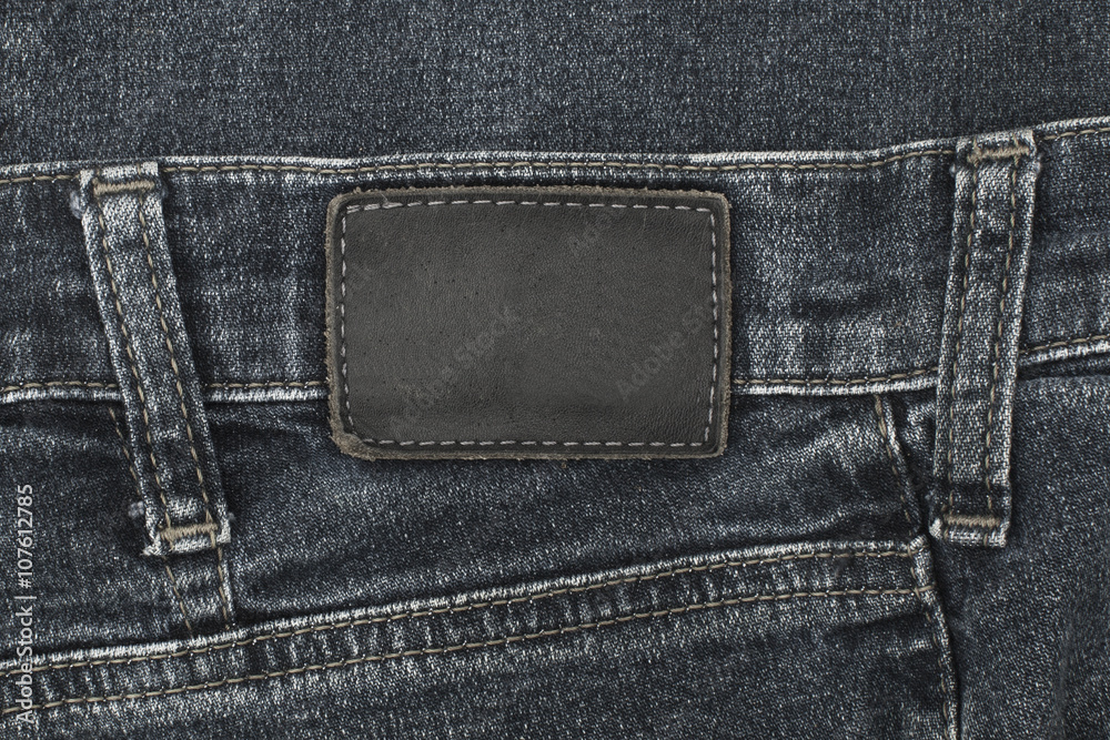 Leather jeans label sewed on black jeans Leather jeans label sewed on black jeans