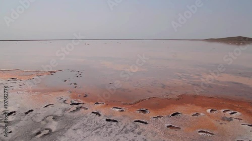 View of deserted salt lake with foot print in the foreground. Koyashskoye lake, Crimea, Ukraine. photo