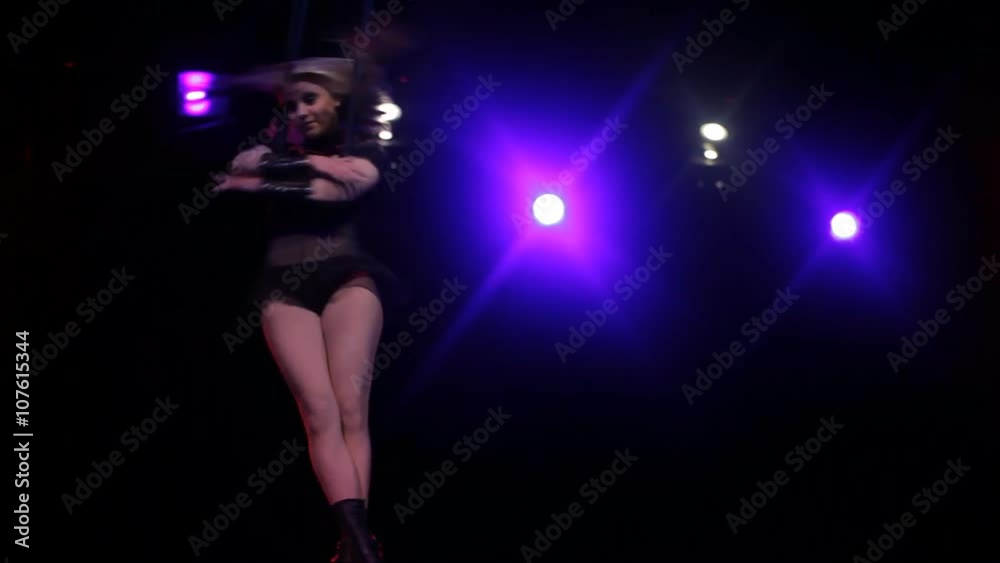 Girl performs dangerous stunt in the circus Girl performs dangerous stunt in the circus