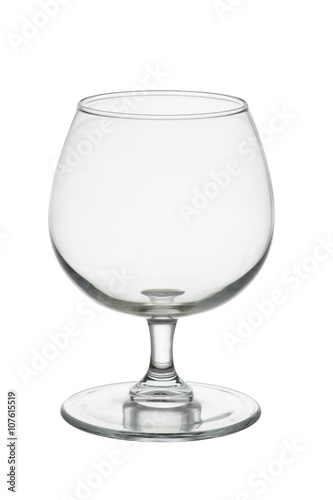 Empty whisky glass isolated on white background