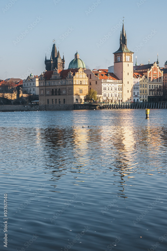 Old Town reflected in the River Vltava shot from Strelecky Ostrov Island Prague at sunrise