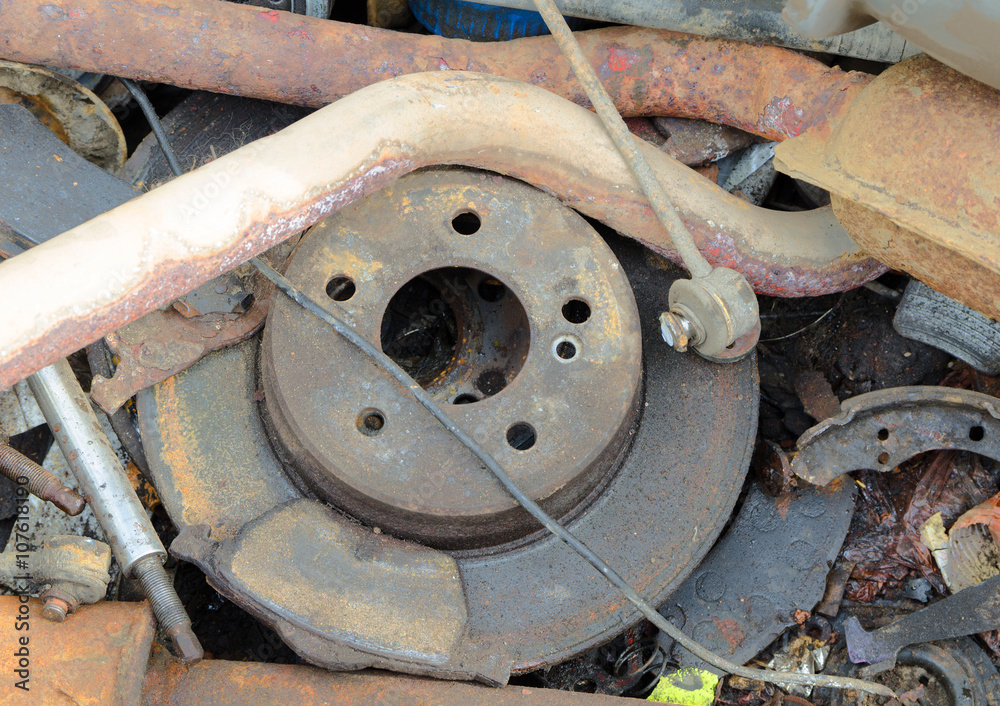 Useless, worn out rusty brake discs shock absorber and other