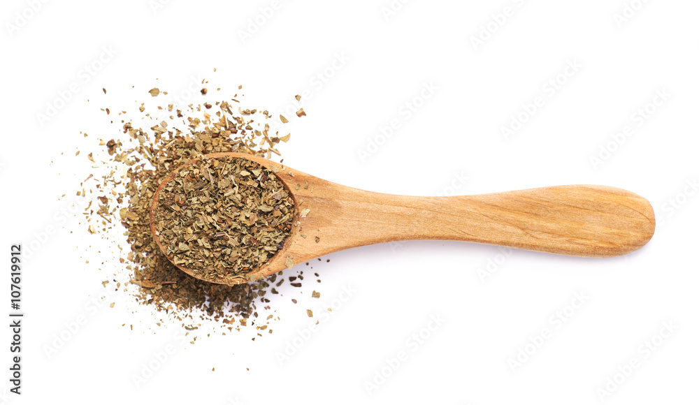 Wooden spoon and dried basil - obrazy, fototapety, plakaty 