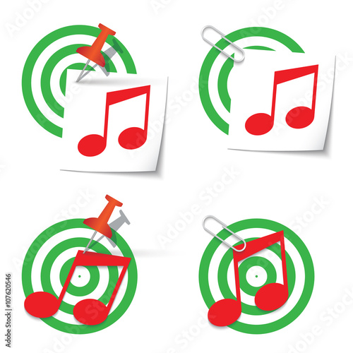 Four targets and thumbtack and paper clip