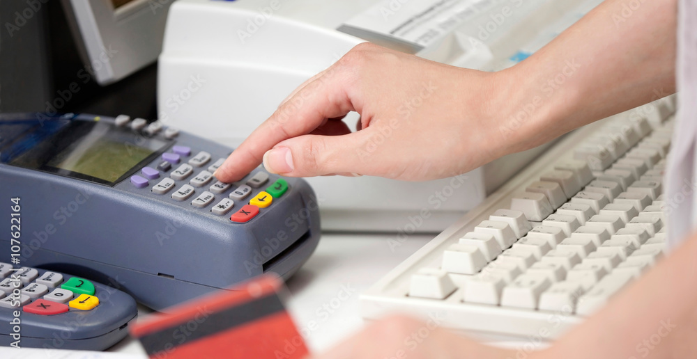 POS Terminal Transaction. Hand Swiping a Credit Card. POS Terminal Transaction. Hand Swiping a Credit Card.