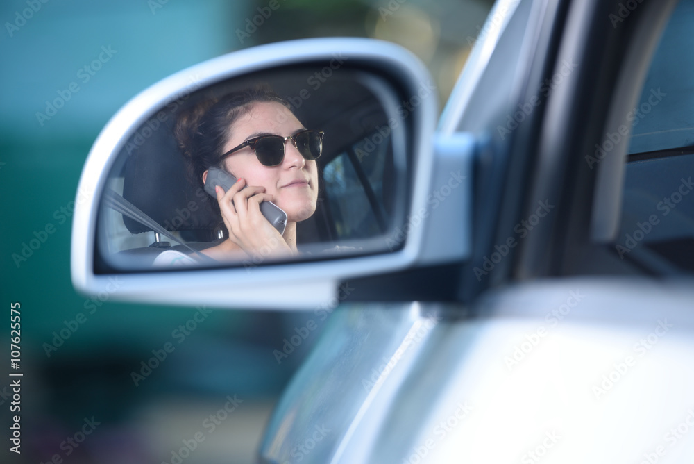 woman talking and driving