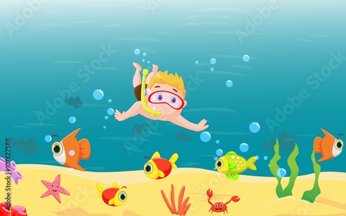 little boy diving in the sea