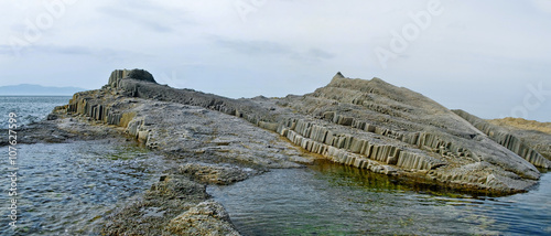 Cape Stolbchatyy, Kurily, island Kunashir, Russia photo