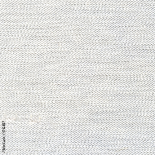 Light jeans texture background. White color canvas