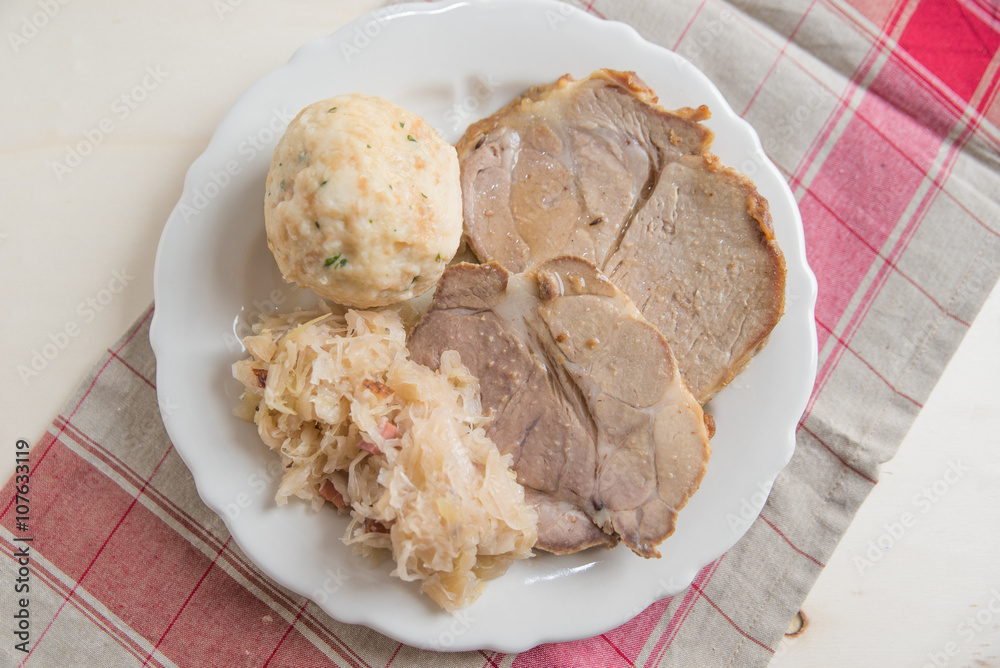 Schweinebraten mit Knödel und Sauerkraut Stock Photo | Adobe Stock