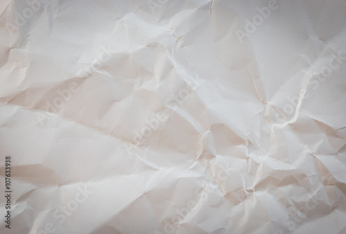 White crumpled paper background texture with vignette