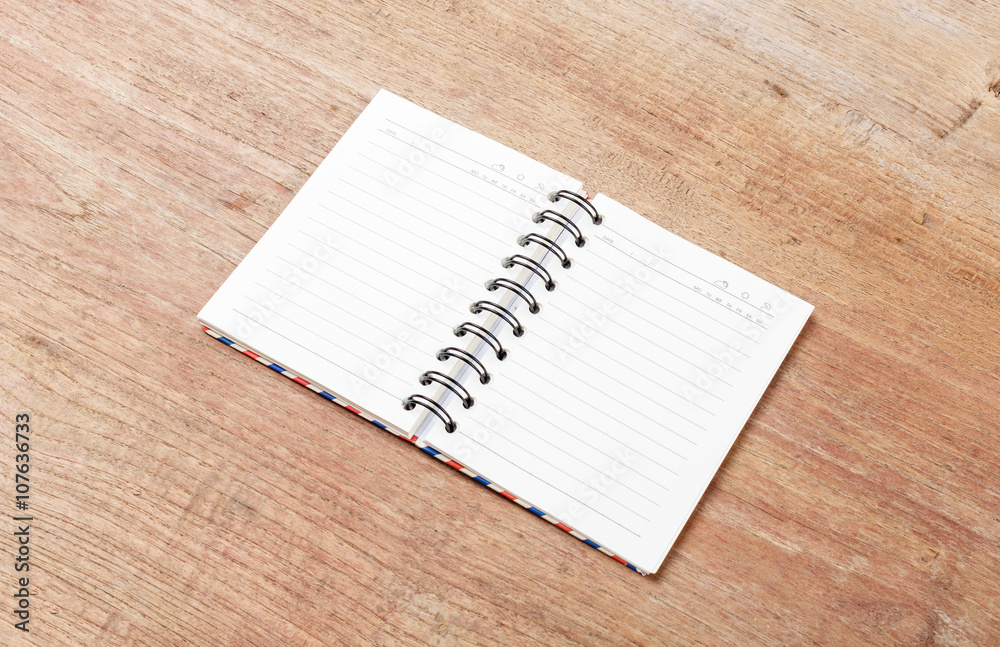 Blank open notebook on wood table,Business template mock up for Blank open notebook on wood table,Business template mock up for