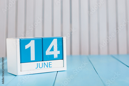 June 14th. Image of june 14 wooden color calendar on white background. Summer day. Empty space for text. Blog Day