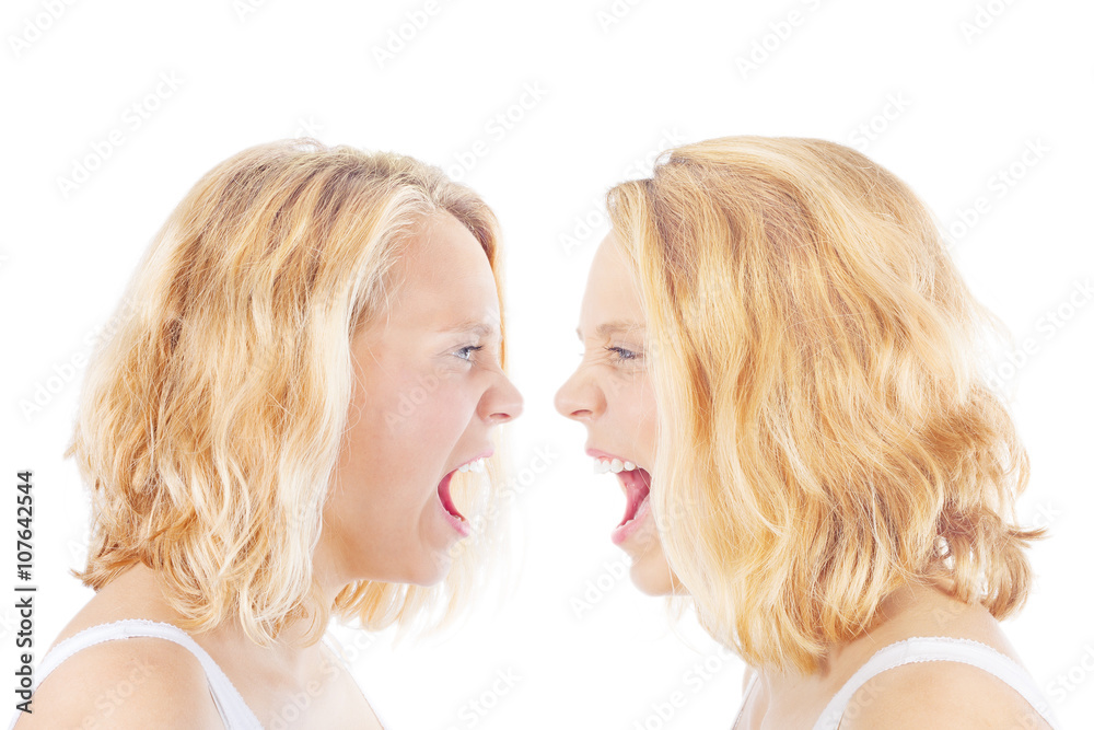Young blonde woman screaming at herself, close up Young blonde woman screaming at herself, close up