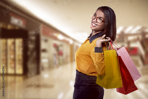Asian woman holding shopping bag