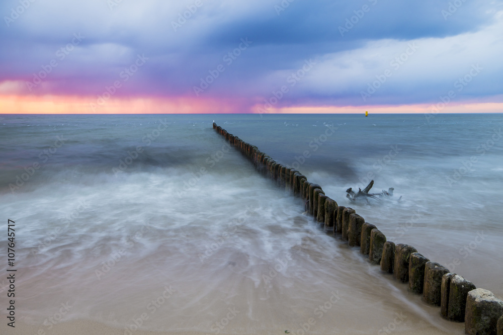 Fototapeta premium sunset over the sea beach 
