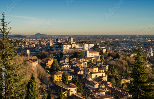 View over Citta Alta or Old Town buildings in the ancient city of Bergamo, Lombardia, Italy on a clear day, taken from San Virgilio point.