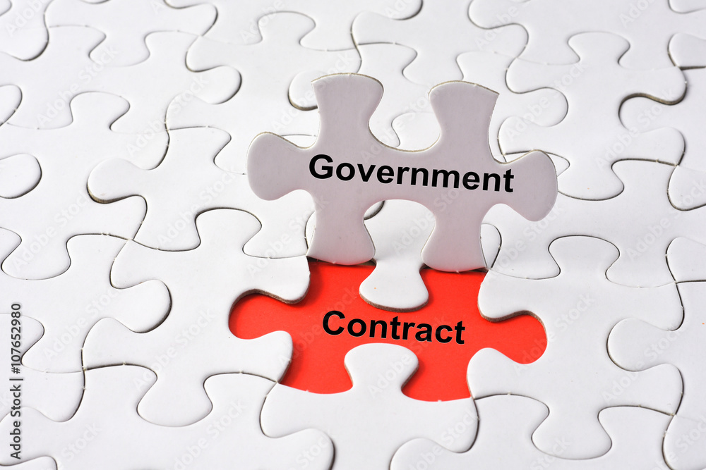 Government contract concept on missing puzzle Government contract concept on missing puzzle