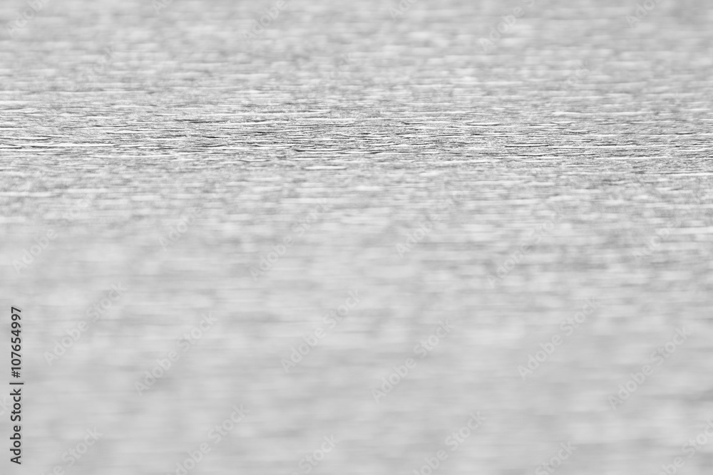 Abstract silver background with blur. The texture. Abstract silver background with blur. The texture.