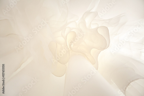 Bottom view of wedding dress in pastel colours