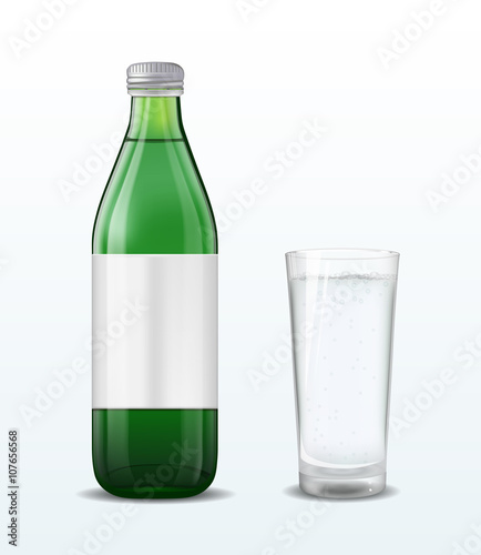 Green glass mineral water bottle on white background