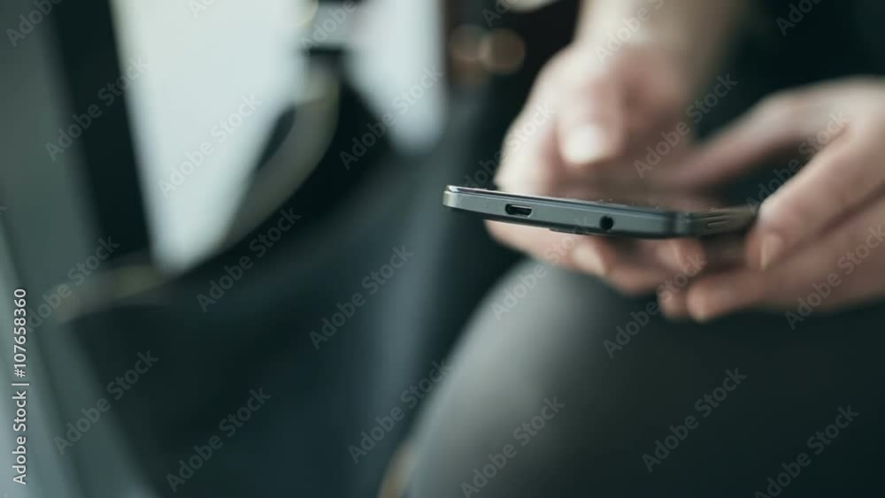Beautiful woman using  smartphone in cafe. 